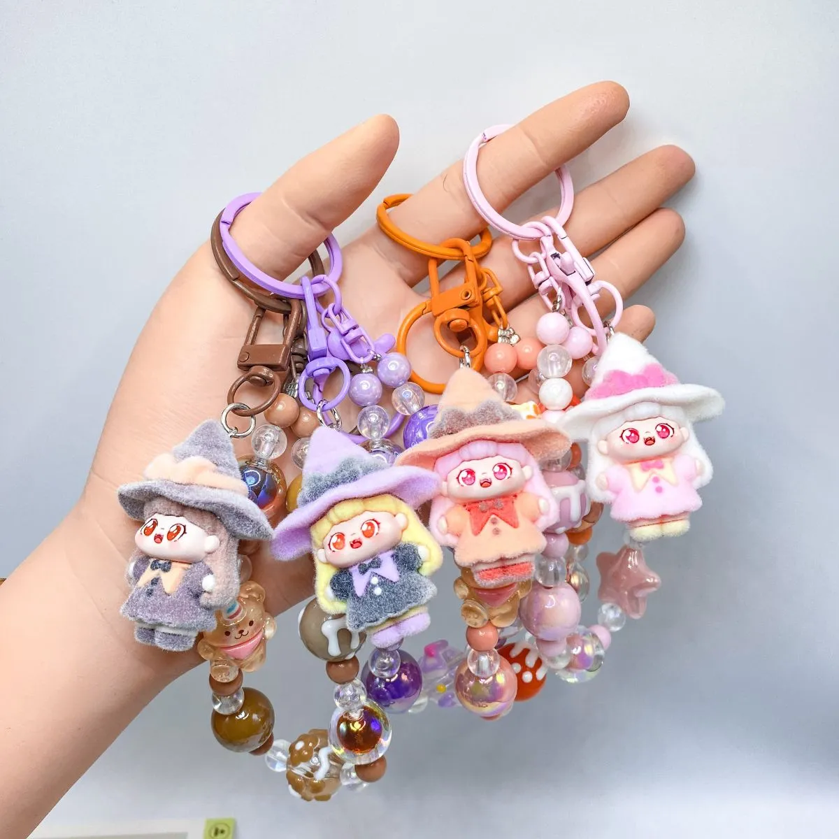Kids Blind Bag Flocked Little Witch Sweetie Doll Keychain – Cute Plush Figure Pendant & Beaded Bracelet, Travel Souvenir Charm for Bags & Keys